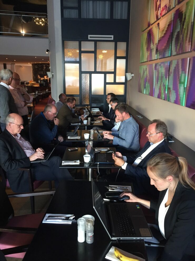 Attendees of the Autumn Roundtable work together on their laptops
