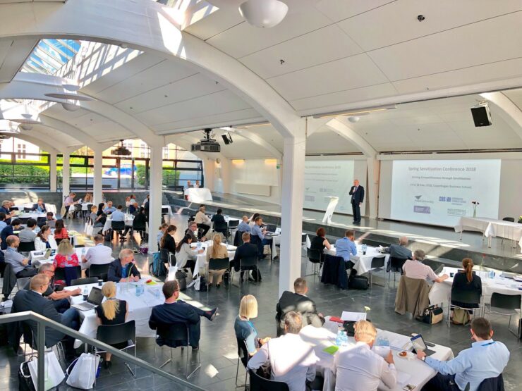 The attendees of the Spring Servitization Conference 2018 listen intently to a talk