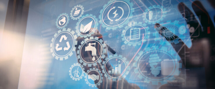 Hands write on a touchscreen covered in service and setting icons