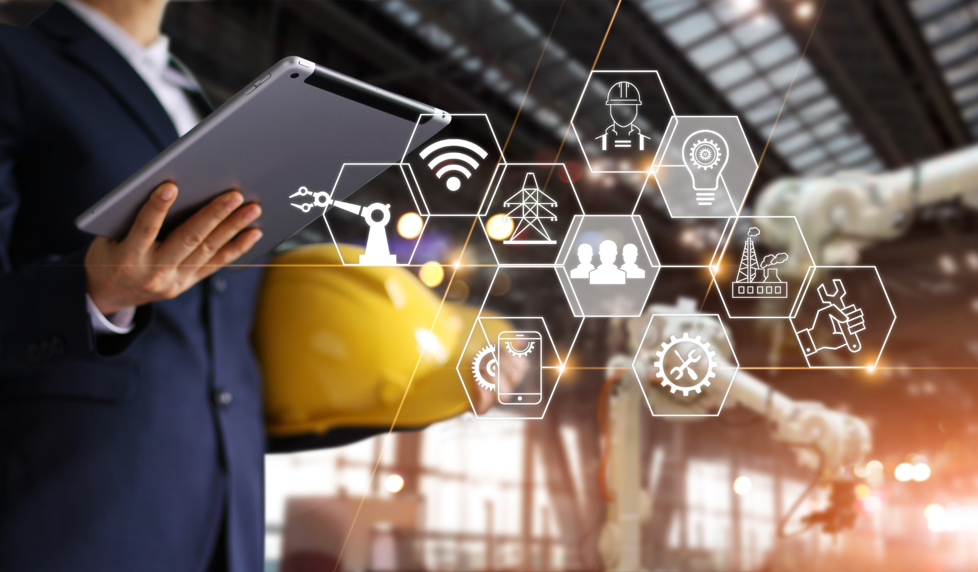 Servitization icons in front of a professional holding a tablet