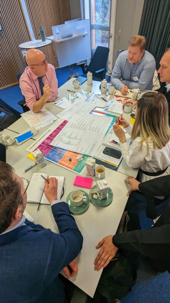 Attendees of an ASG hosted servitization event collaborate together