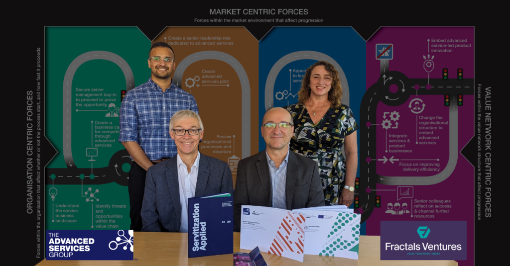 ASG employees smile surrounded by their educational and promotional materials