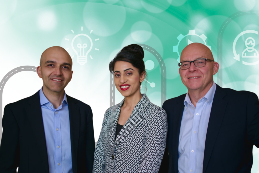 3 ASG employees smile at the camera