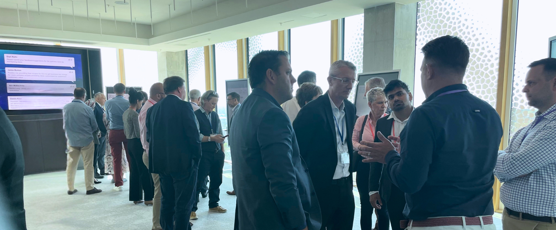 Attendees of the spring roundtable talk together in circles