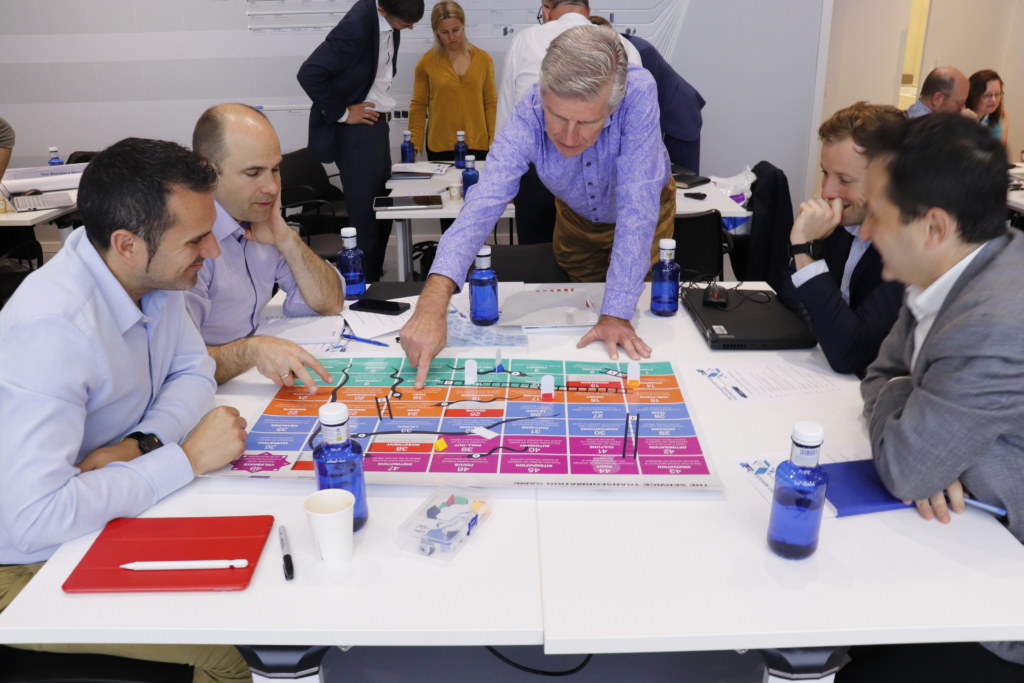 5 colleagues collaborate during an ASG training session