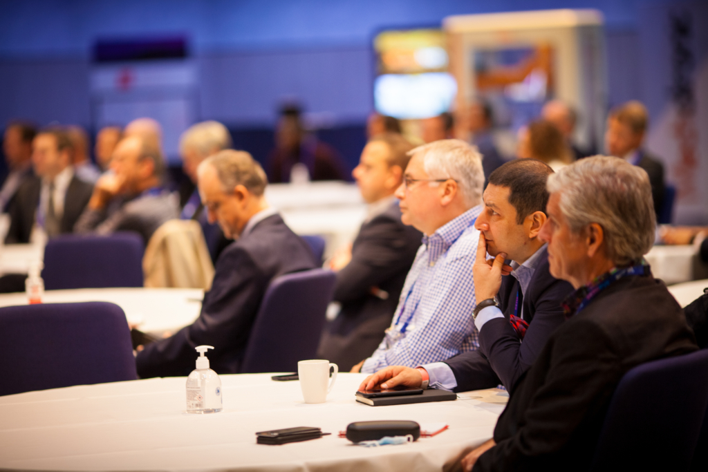 Attendees of an ASG conference listen intently