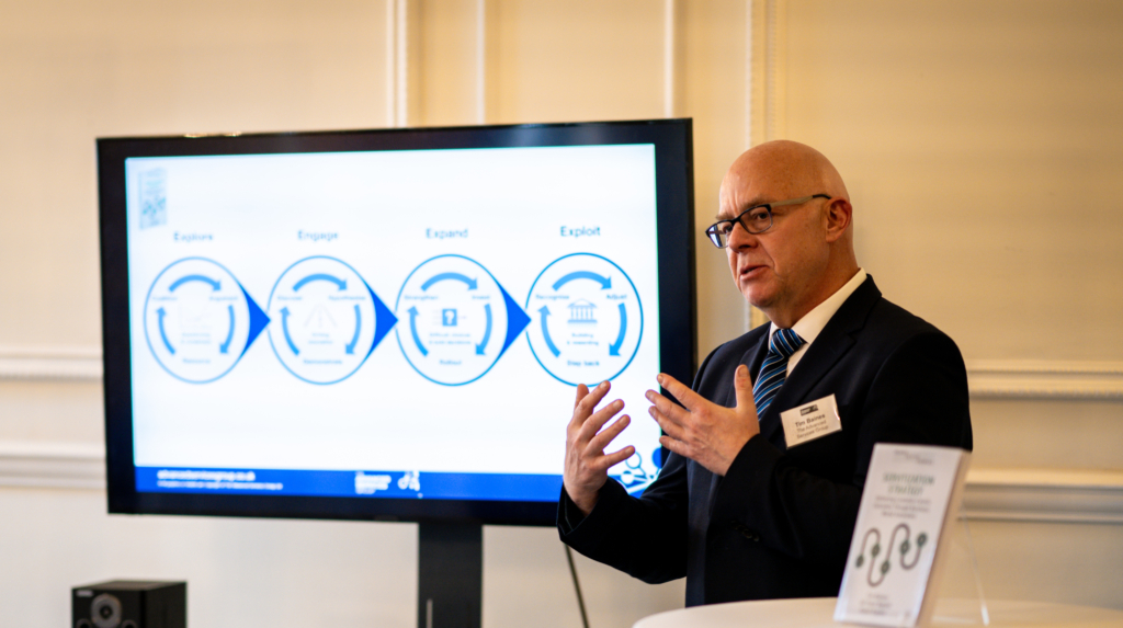 An ASG representative delivers a talk at an ASG event